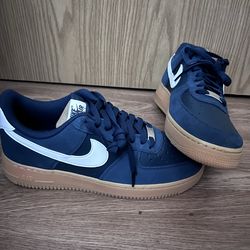 Nike Air Force 1 '07 LV8 shoes, likely in the Armory Navy or Anthracite colorway