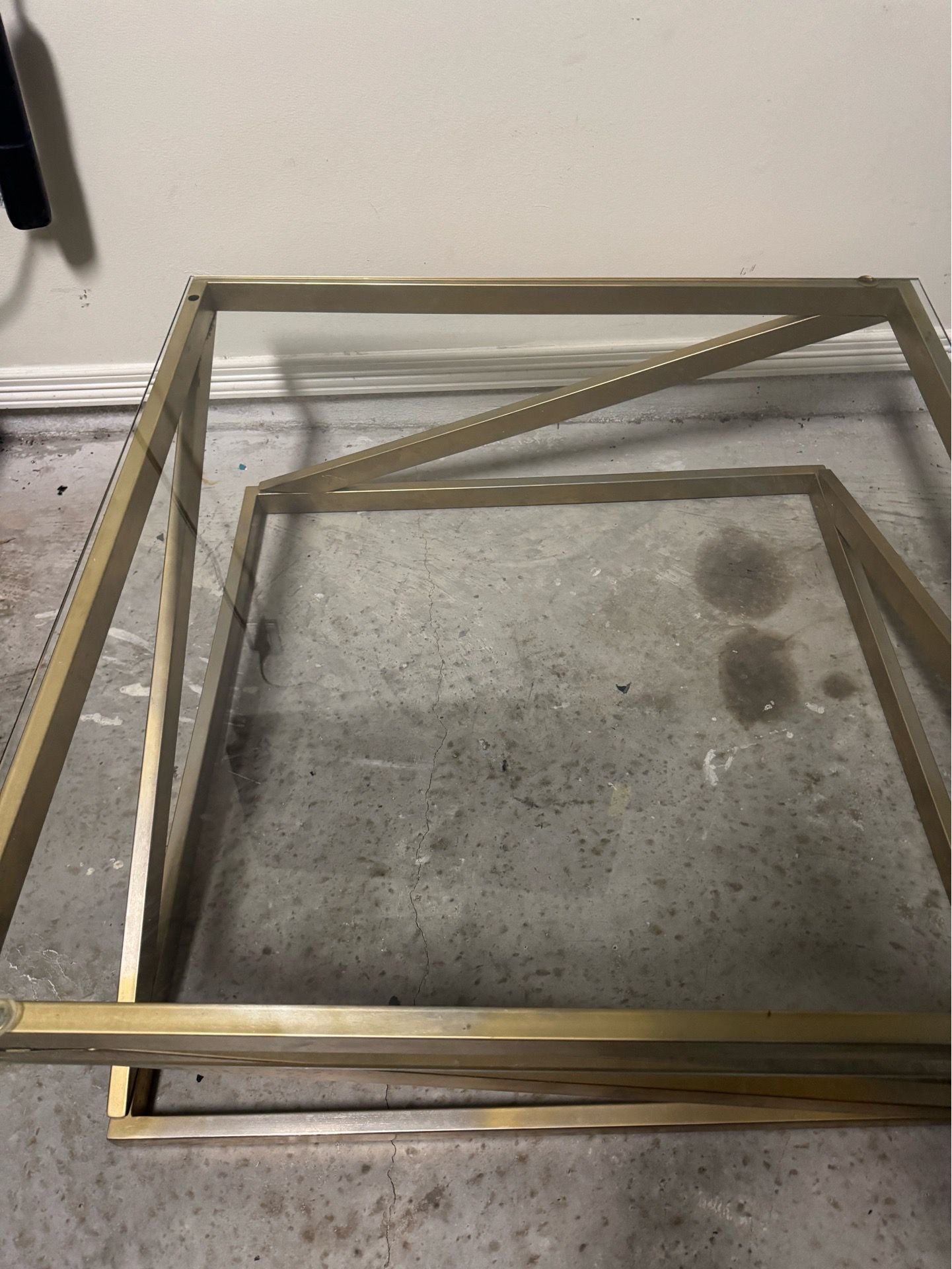 Gold glass table centered for living room