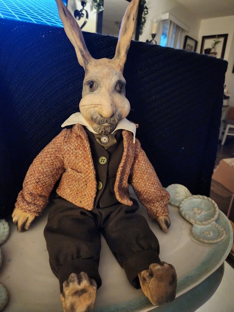 Dapper porcelain Rabbit. Twead coat. Tailored wool suit