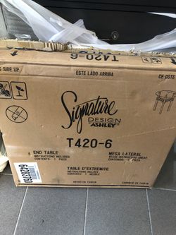 Brand new Ashley end table