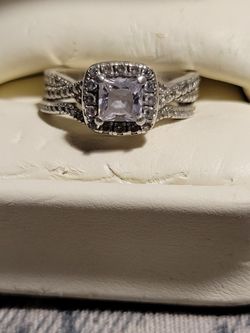 Size 7 Sterling Sivler W/ White Sapphires.