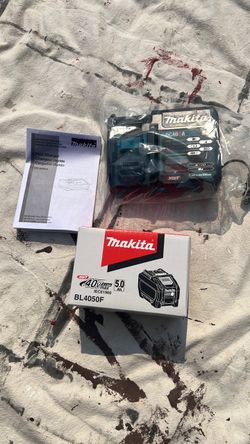 Makita  XGT. 40 V. Max.  Fast charger and. Battery.  5.0. AH