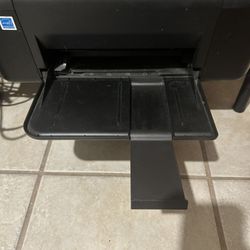 HP Deskjet F2480 All-in-One printer. This model is an older inkjet printer that can print, scan, and copy. 