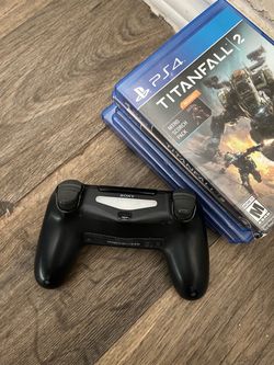 PS4 controller and 5 games