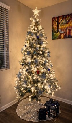Beautiful white Christmas 🎄 tree with presents, stars etc and bag