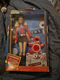 Barbie with tickle me elmo