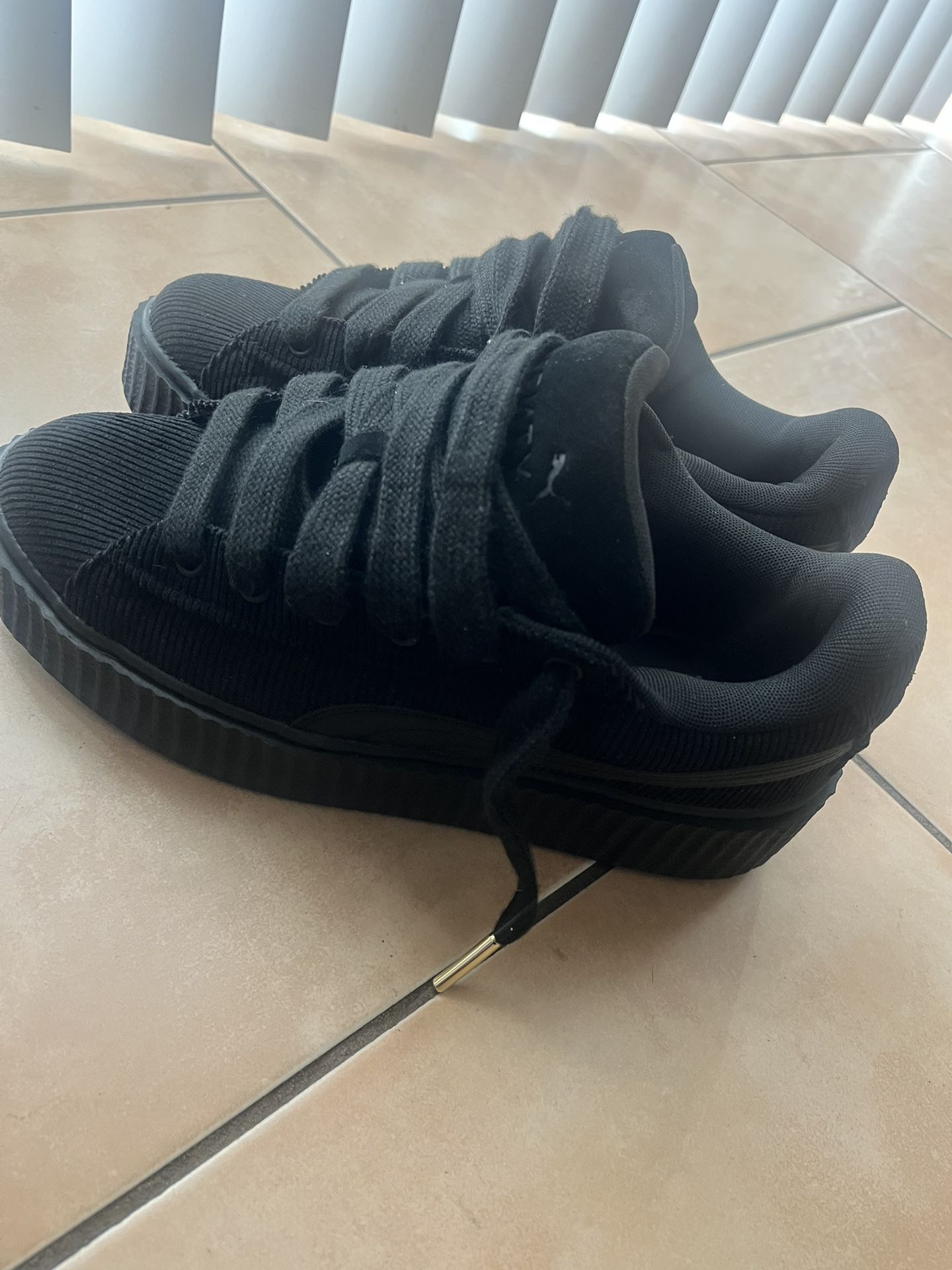 Black Fenty Pumas
