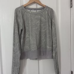 Lululemon long-sleeve top Size S, performance, sheer chiffon-style hem 