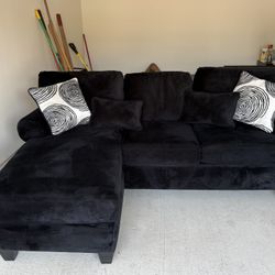 Black Sofa With Chaise And Ottoman 