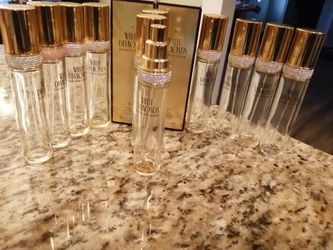 (13) Empty bottles(1.7 oz) and 5 Empty bottles (3.4 oz) of White Diamonds for refills