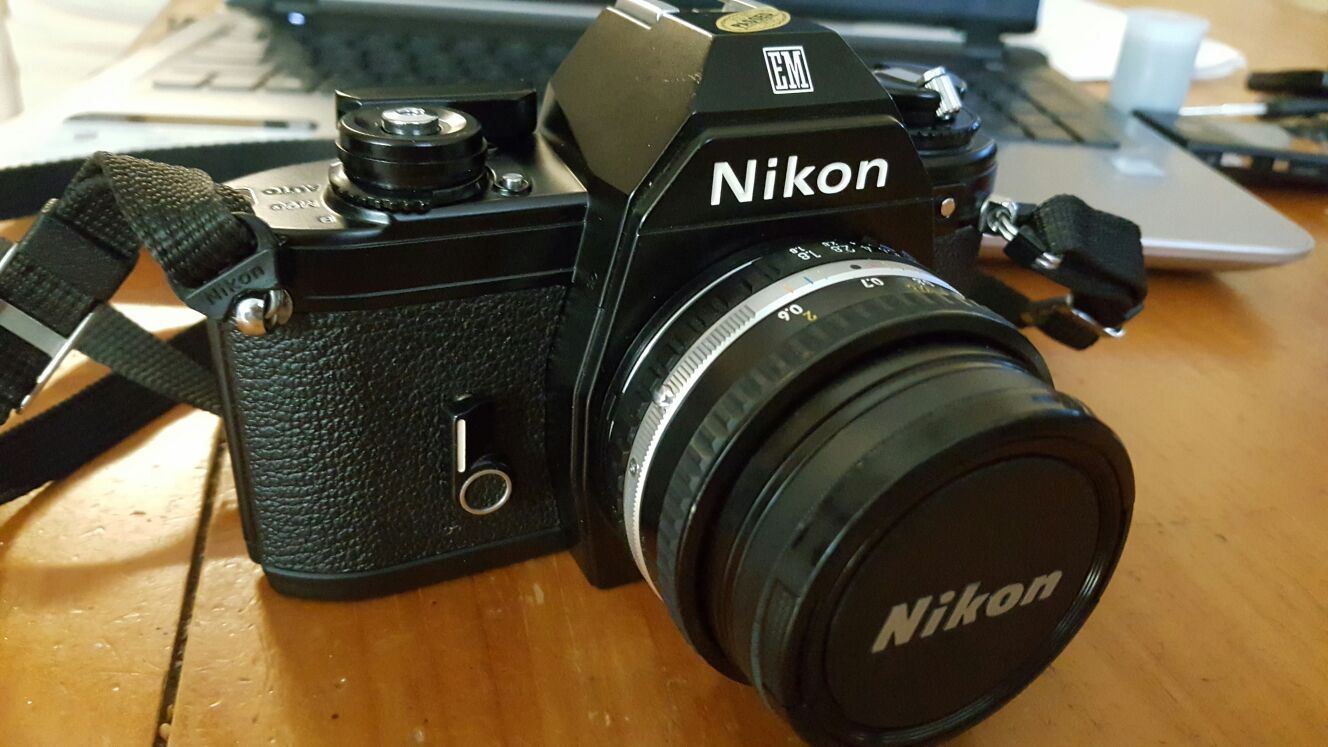 Nikon EM Camera w/50mm f1.8 Lens