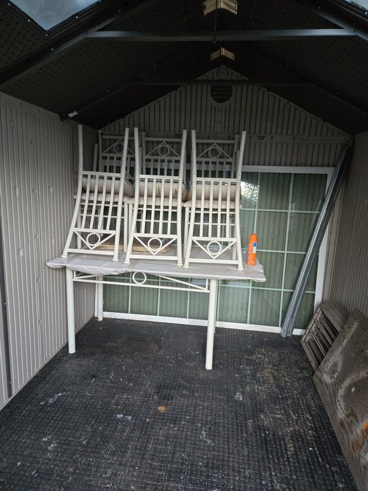 Wrought Iron Outdoor Table And Six Chairs