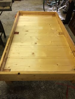 Raised wooden Bed