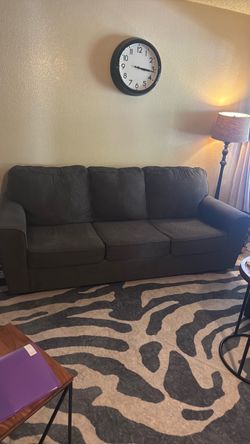 Two sofas charcoal dark grey.