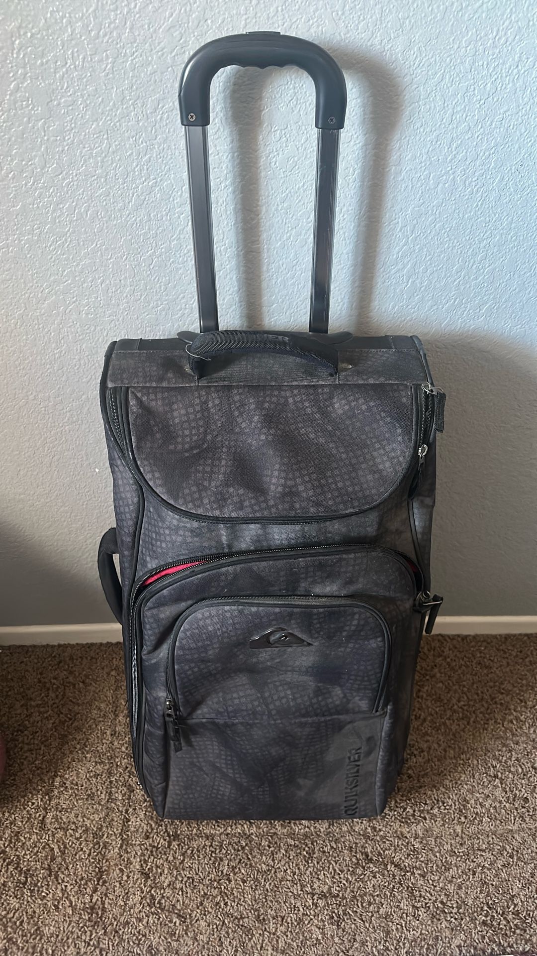 Quicksilver Luggage Rolling Suitcase