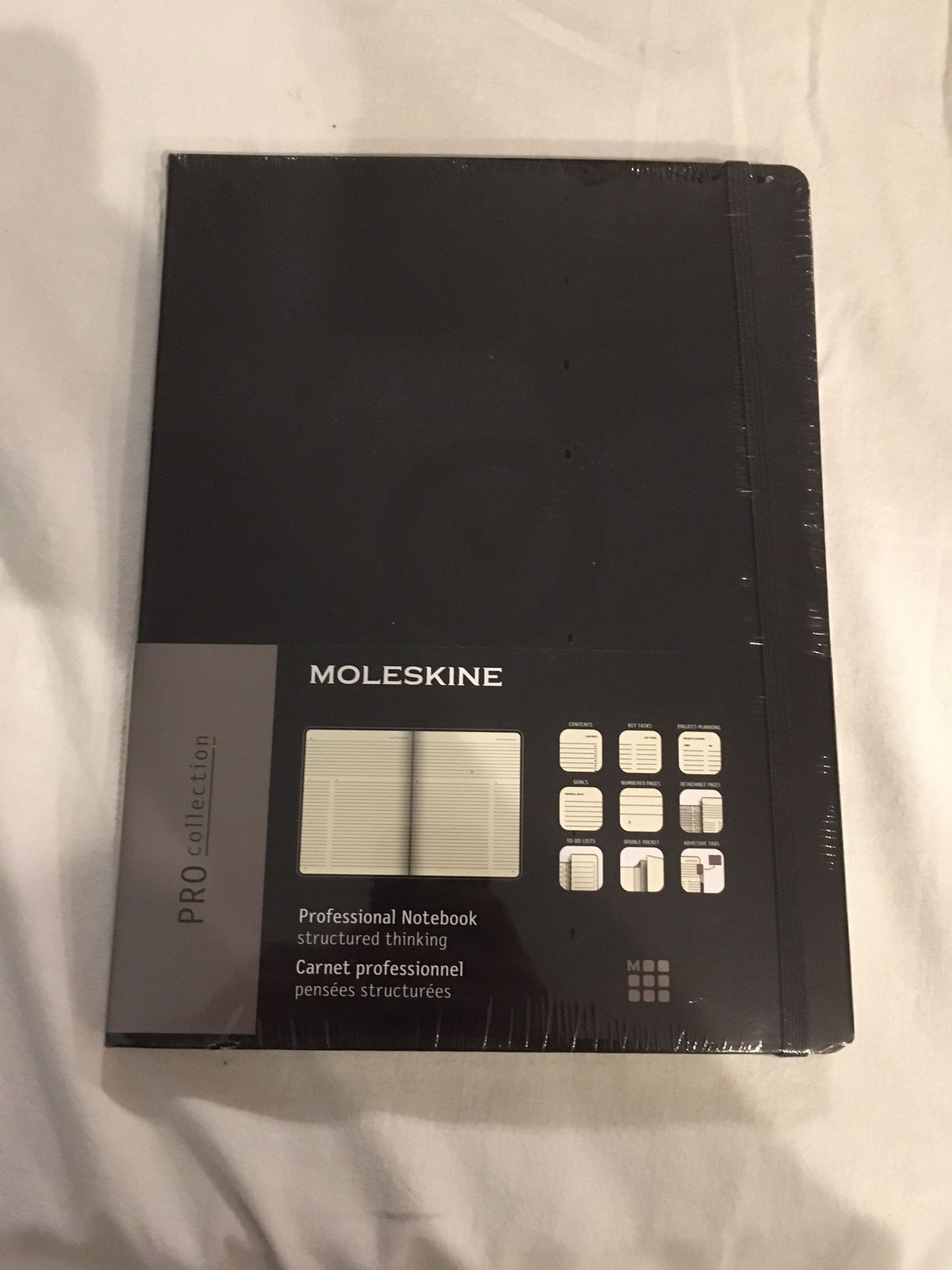 Moleskine Notebook / Symantec Logo