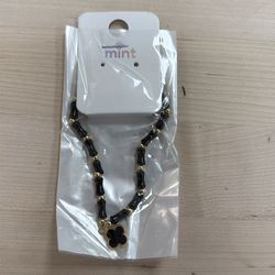 Brand New black and gold bracelet
