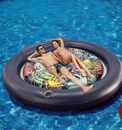 Large round tanning pool lounger