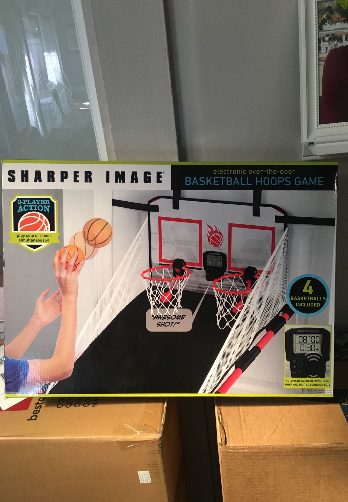 Sharper image electronic basketball hoops game