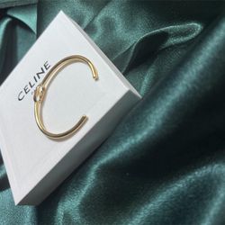 Céline Brass bracelet with gold finish