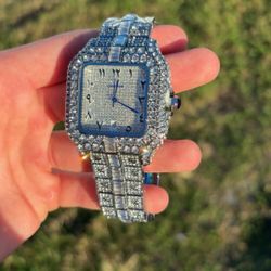 All silver Cartier bust down watch
