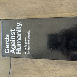 Cards Against Humanity And Monopoly Board Games