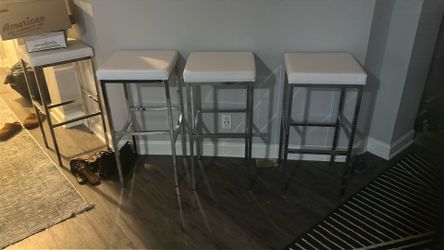 Counter high table and 2  chairs