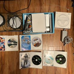 Wii Console and games(No Remotes)