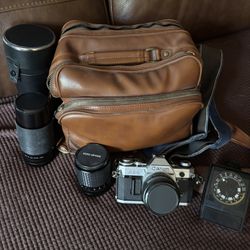 Vintage AE-1 Canon Camera With Lenses 