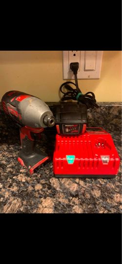 Milwaukee M18 Impact Driver battery and charger
