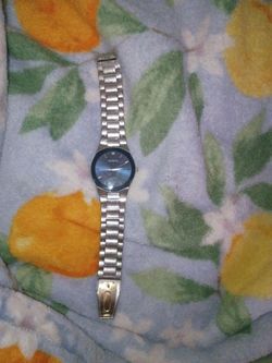 A silver Geneva diamond accent watch.