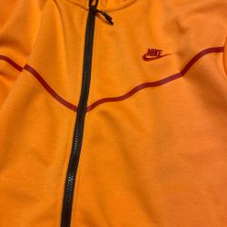 Orange Nike Tech 