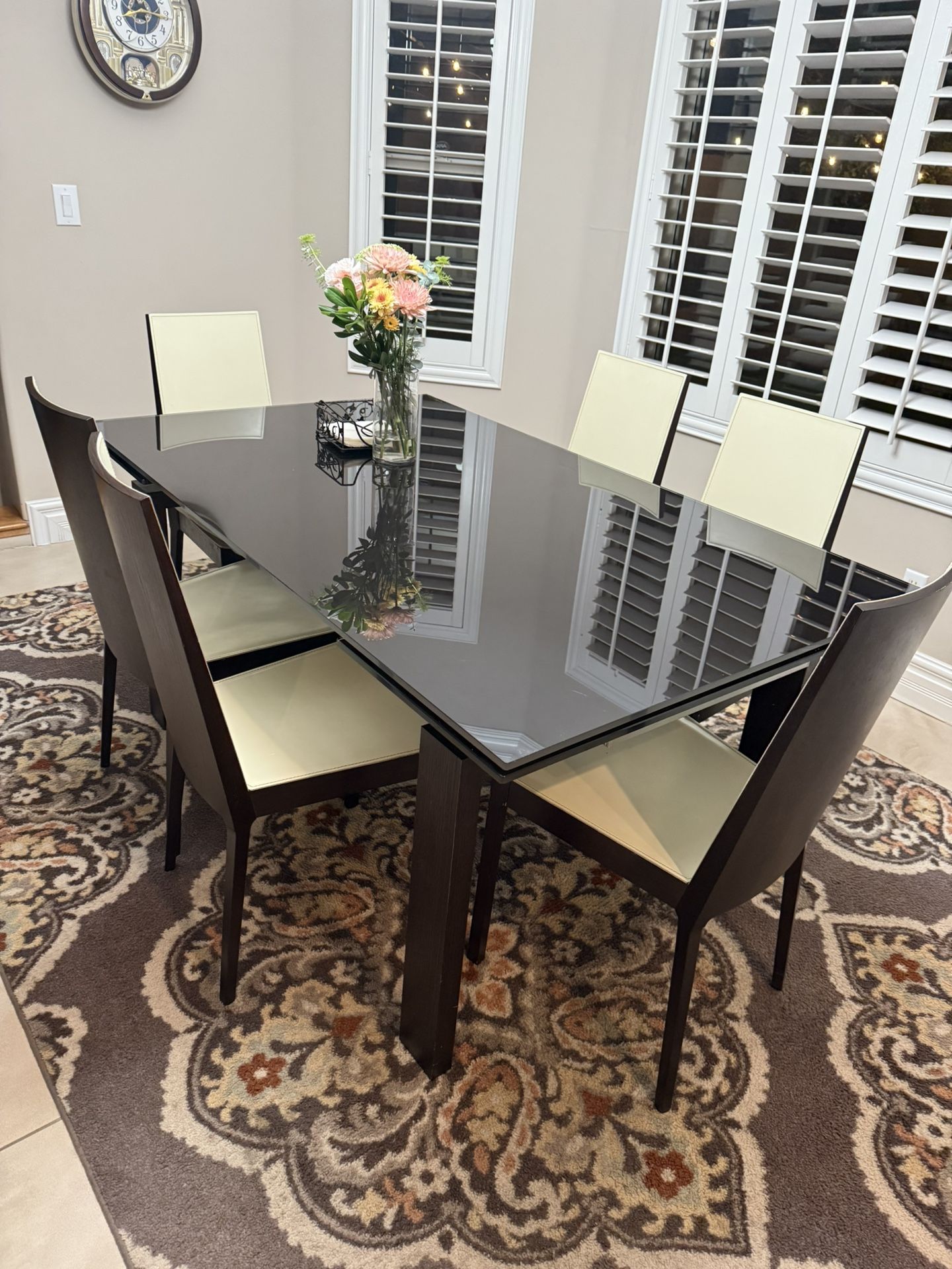 Dining table set with six chairs.