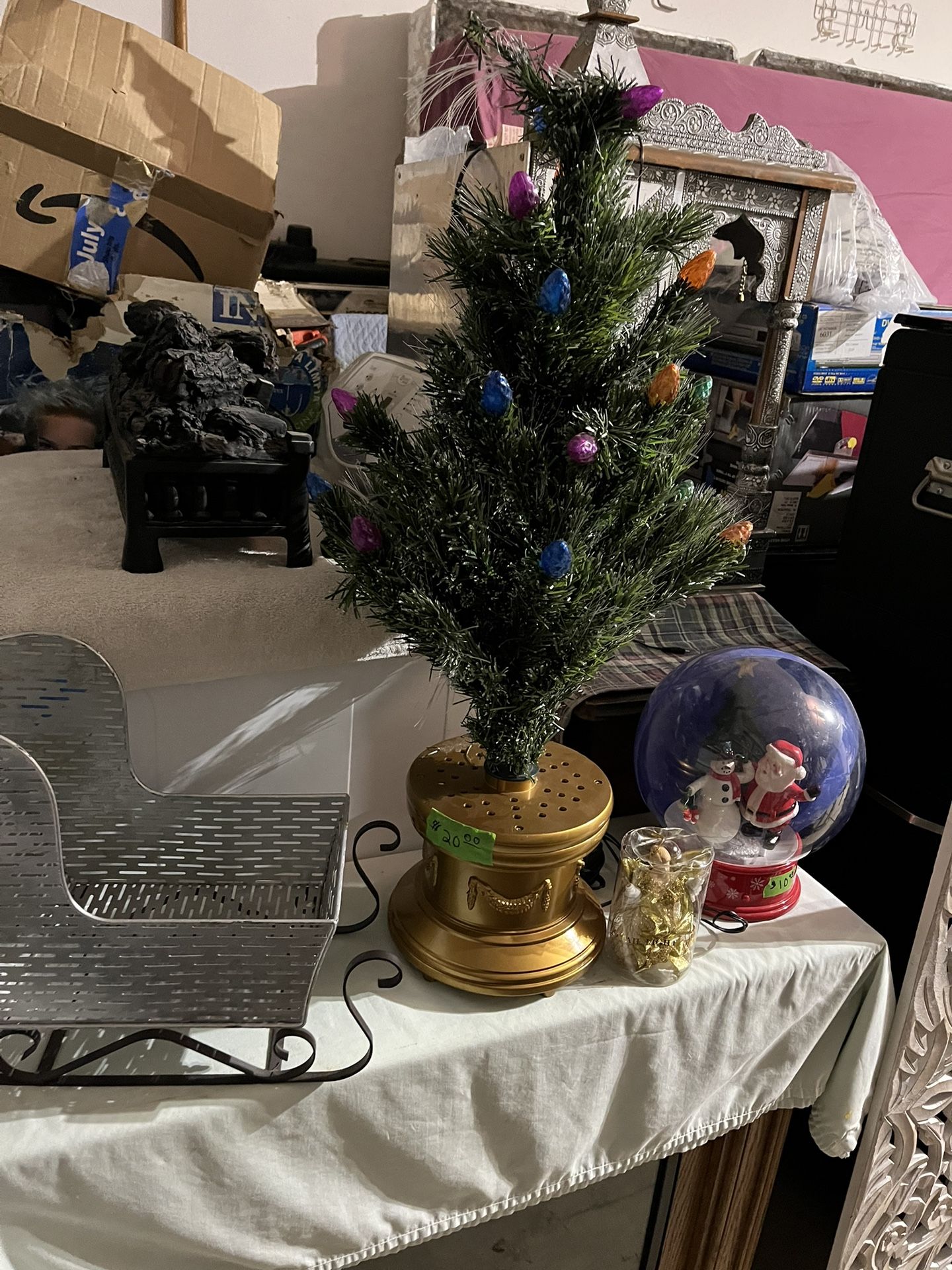 $10 Light Up Tree, $5 Slay, $10 Each Big Bear,$25 Light Up Fire Logs, $5 Snow Ball