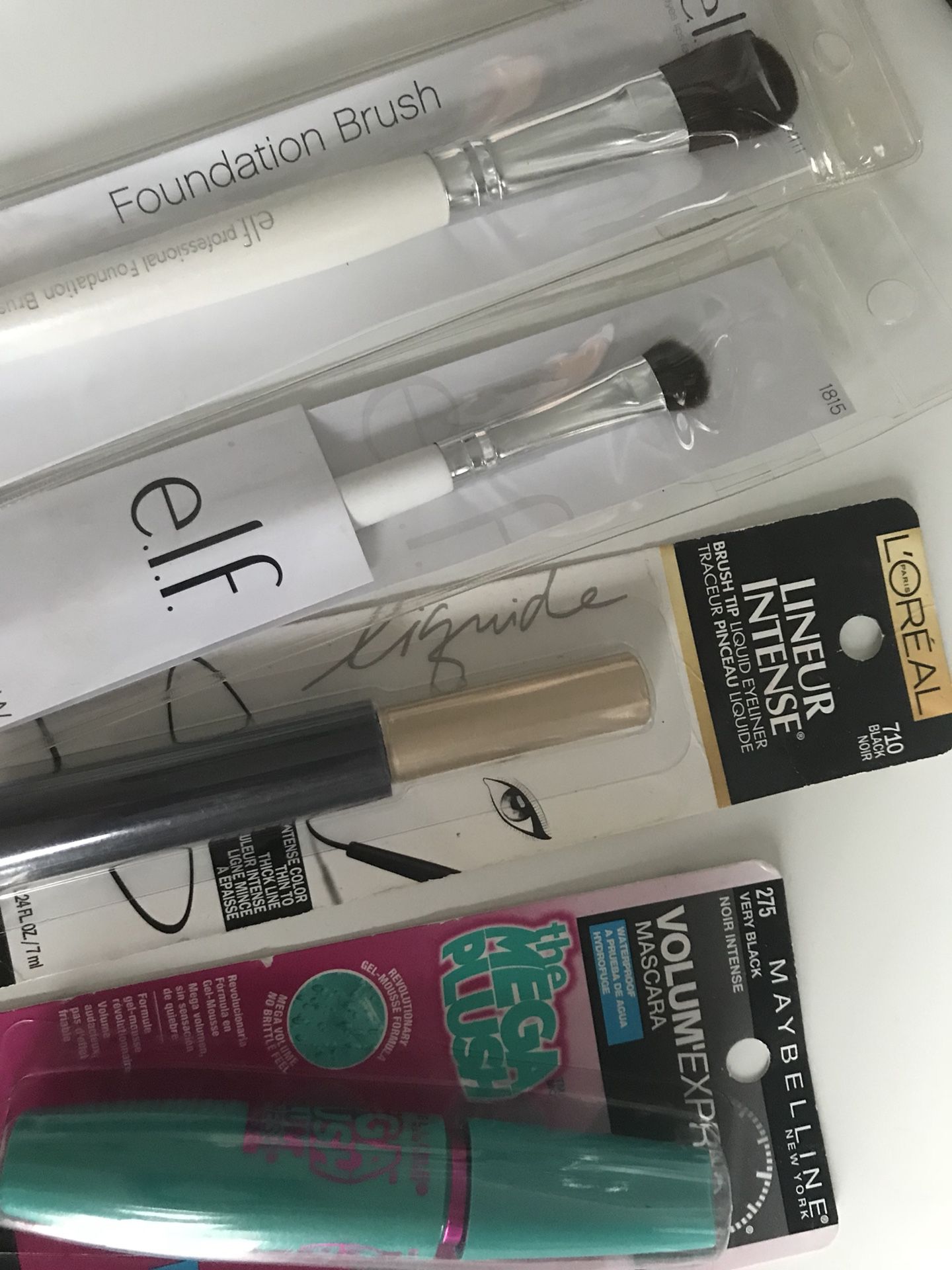 Brand new mascara, liquid eyeliner, elf eyeshadow and foundation brush , fenty beauty by Rihanna (color is Ridlllc) going through all my makeup and g