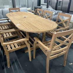 Outdoor solid wood dining table and chair set (nine pieces),$1500