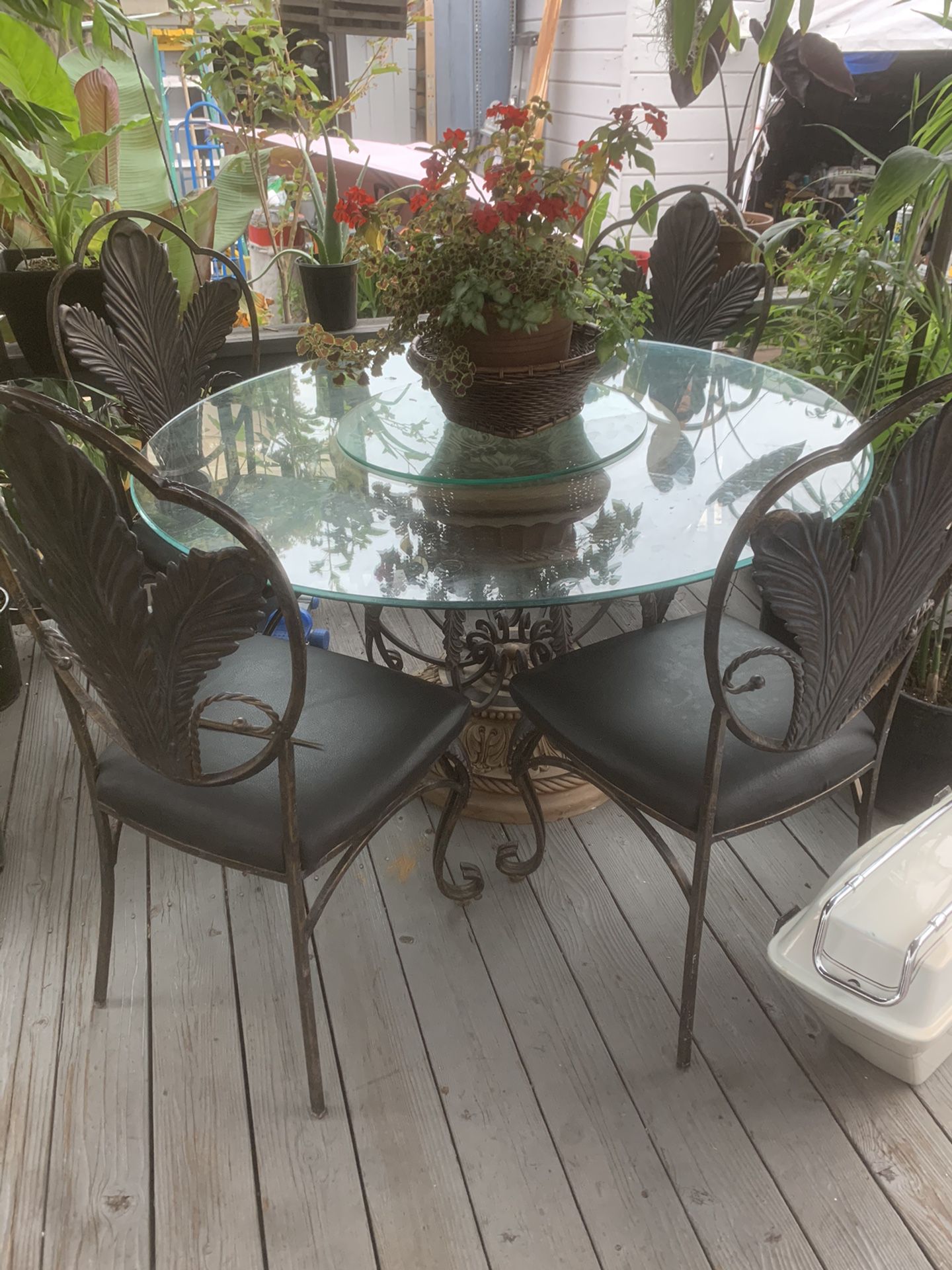 Beautiful 54” Glass table and 4 metal matching chairs