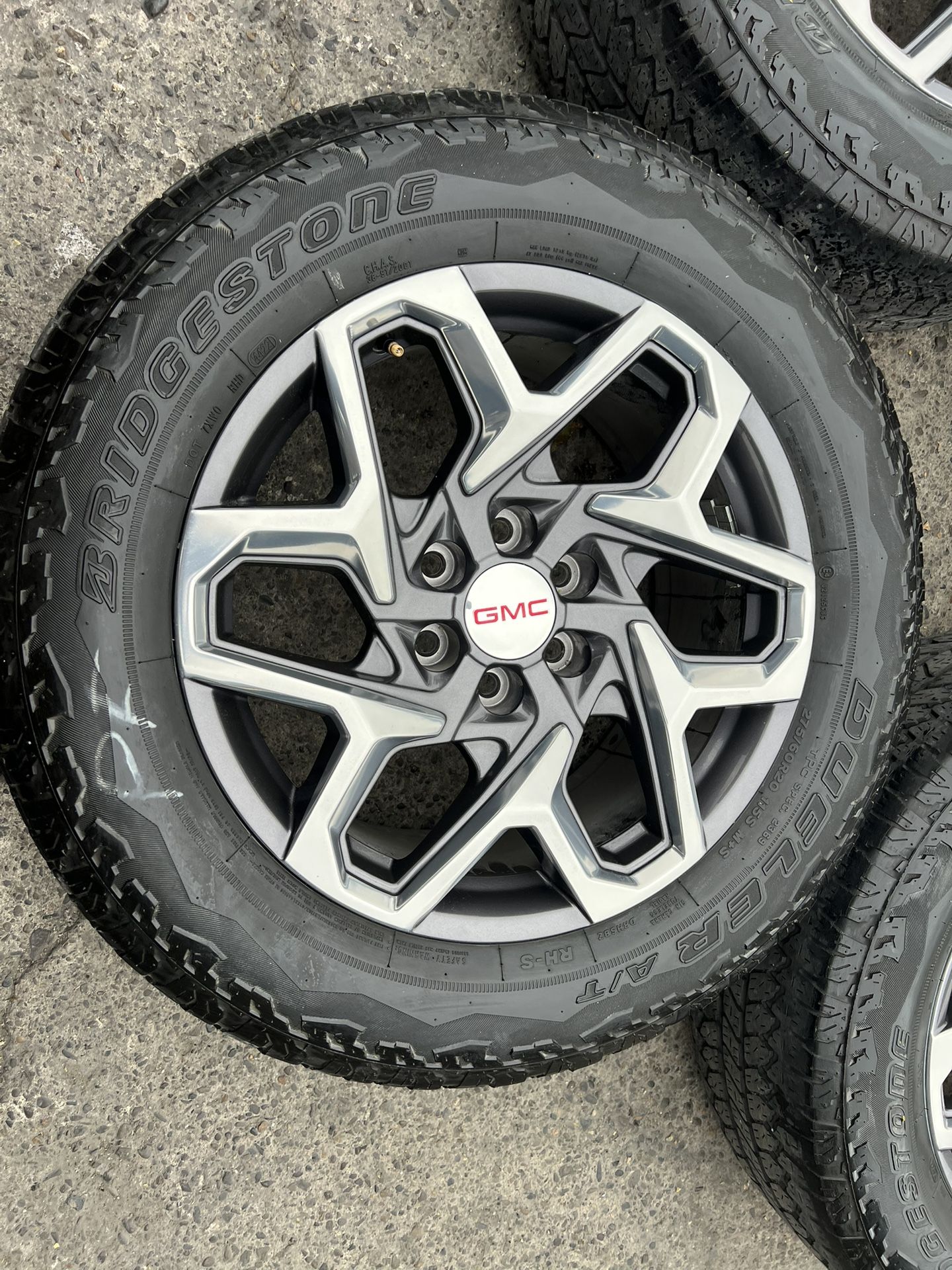 20” Gmc Denali Yukon. Stock rims and tires for sale 6 lug with AT tires