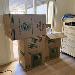 Moving boxes - large, with packing paper and wardrobe boxes