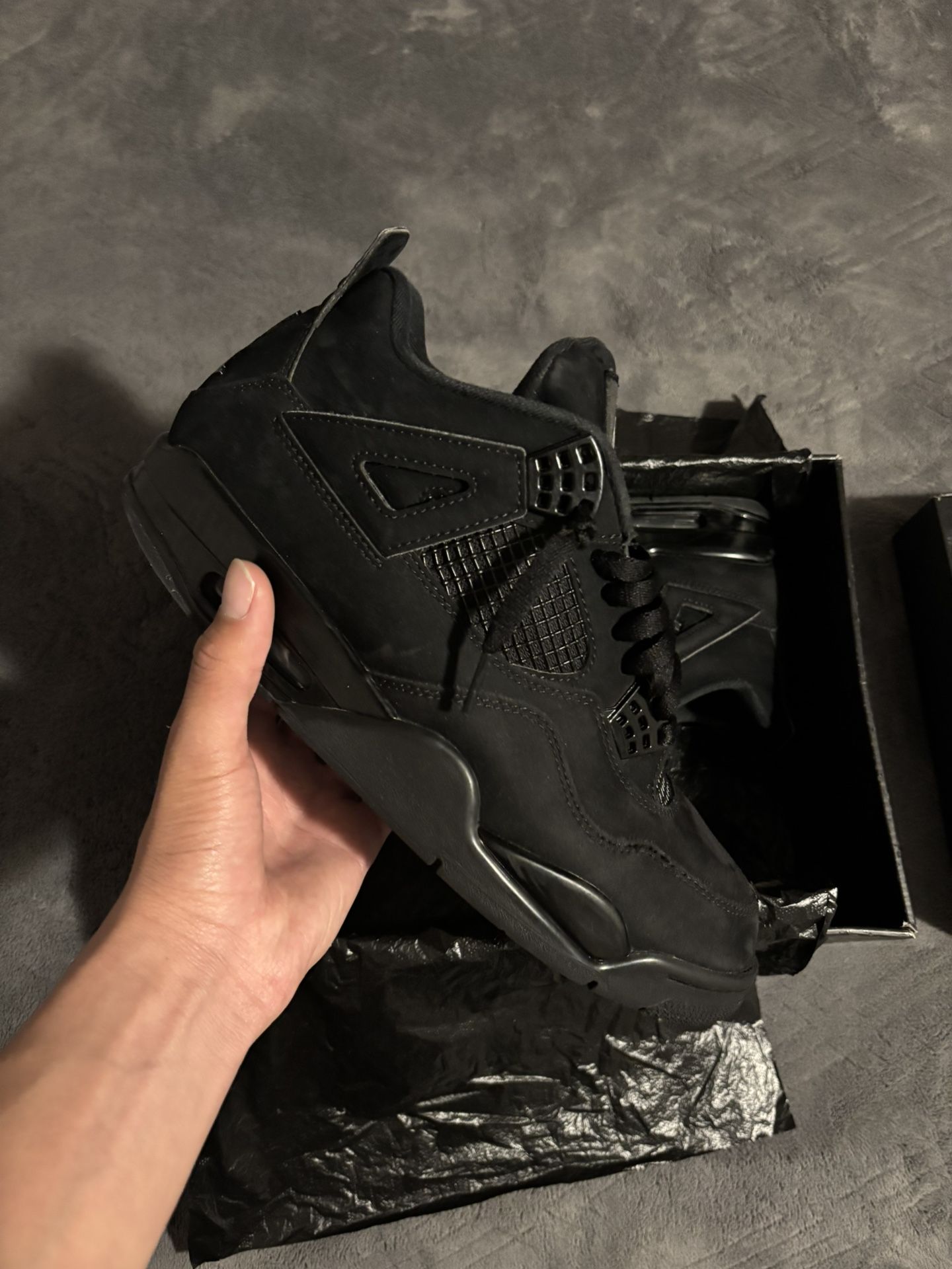 Black Cat Jordan 4s