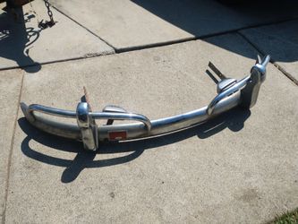 1967 rear vw bug bumper complete with crash bar brackets and lights $200
