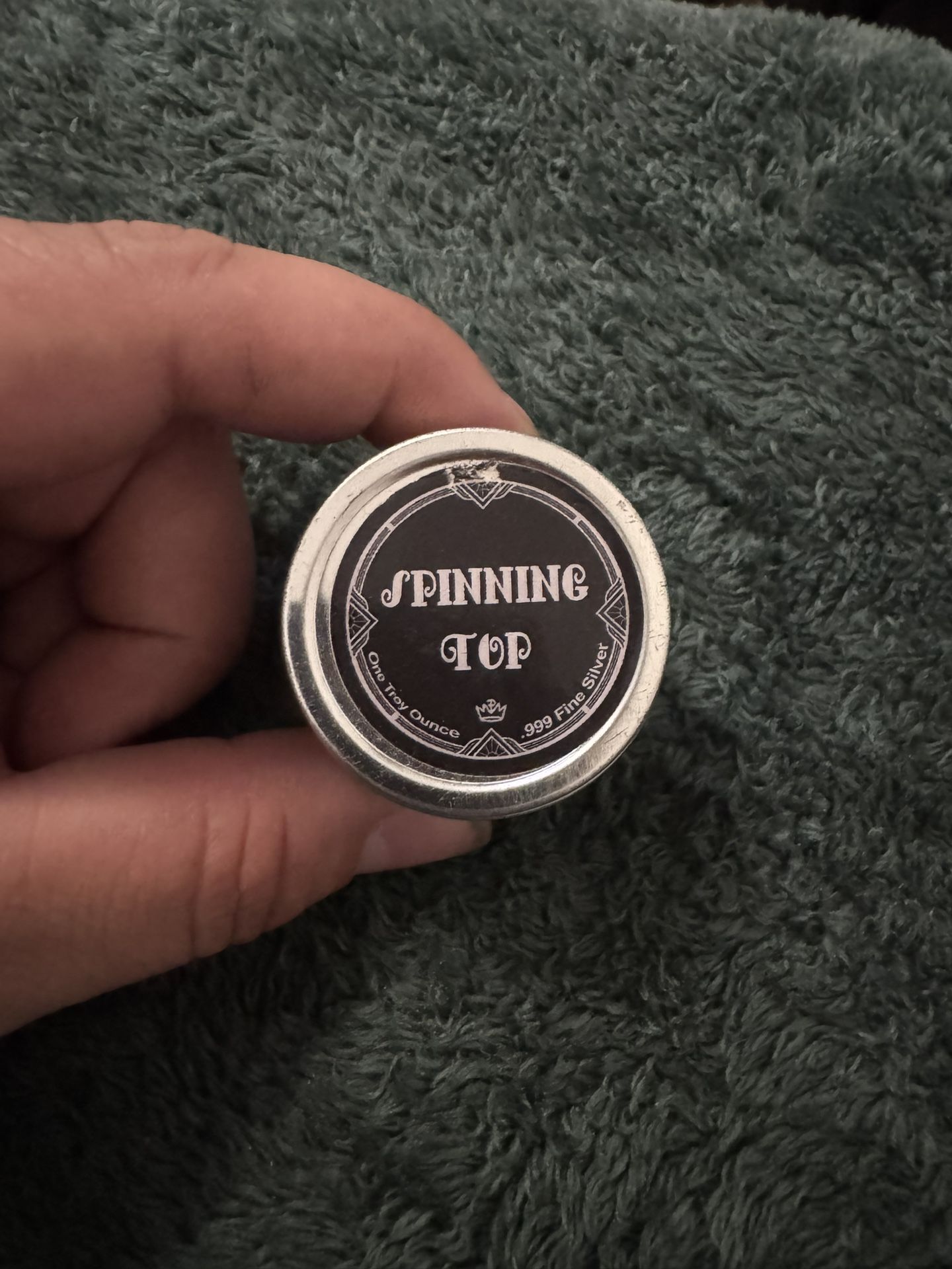 1oz Silver Spinning Top.