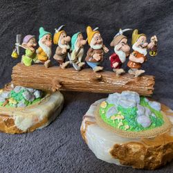 Ron Lee figurine “Heigh- Ho” from Disney’s “Snow White and the Seven Dwarfs.”