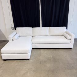 Abbyson.com Furniture • Mid-century Inspired Chaise Sectional with Cylindrical Bolster Pillows (Beige)