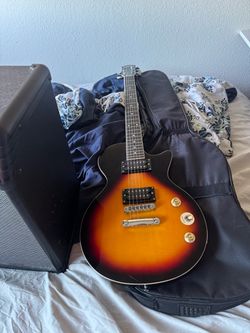 Bocina line6 y guitarra eléctrica doner