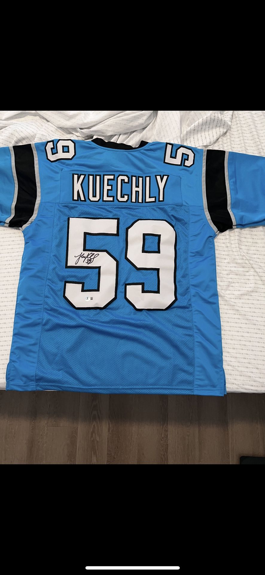 Autographed Luke Kuechly Jersey - XL