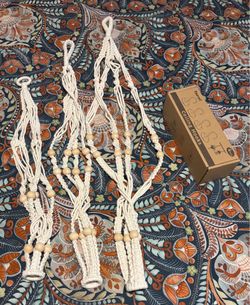Macrame plant holders with hooks