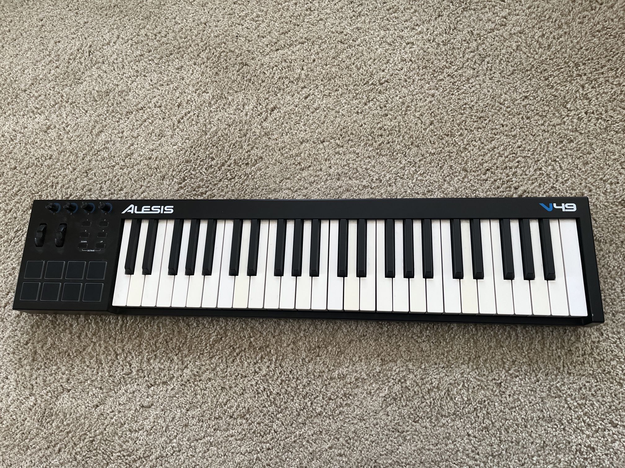 Alesis V49, a 49-key USB-MIDI keyboard controller designed for music production and performance