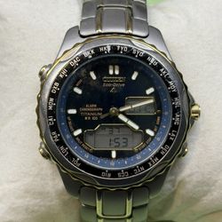 Citizen Men’s Eco Drive Titanium Wristwatch Alarm Chronograph C605 Q00567 TA