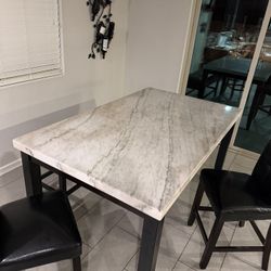 Marble rectangle counter height table. 